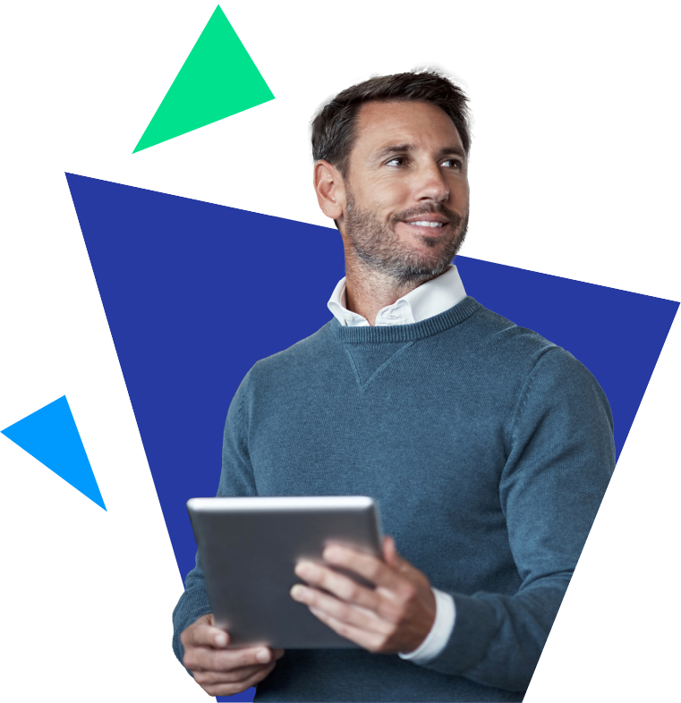 A corporate man looks off to the right with an ipad in his hands.